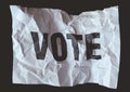 Crumpled paper withÃÂ word vote printed,ÃÂ collapse of democracy Royalty Free Stock Photo